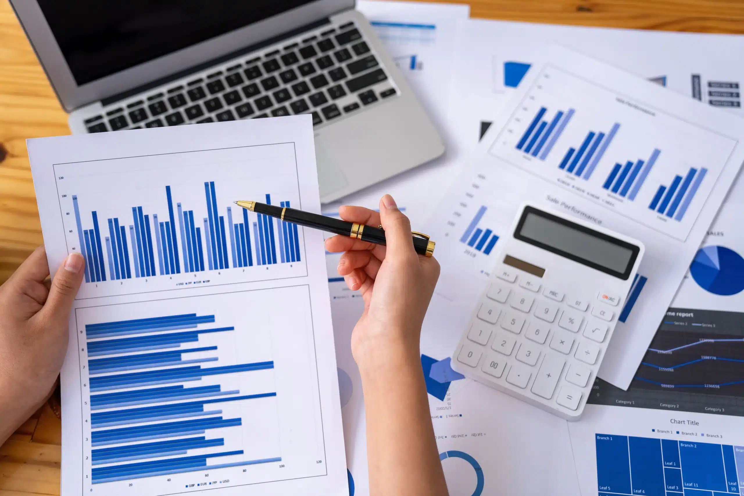 happy-digital-software-app-development-company-businesswoman holding graph pen to analyze marketi 2023 11 27 05 26 09 utc scaled